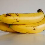 Deciding between bananas and dates for your morning routine? Learn how these fruits impact your digestion and blood sugar when eaten on an empty stomach.