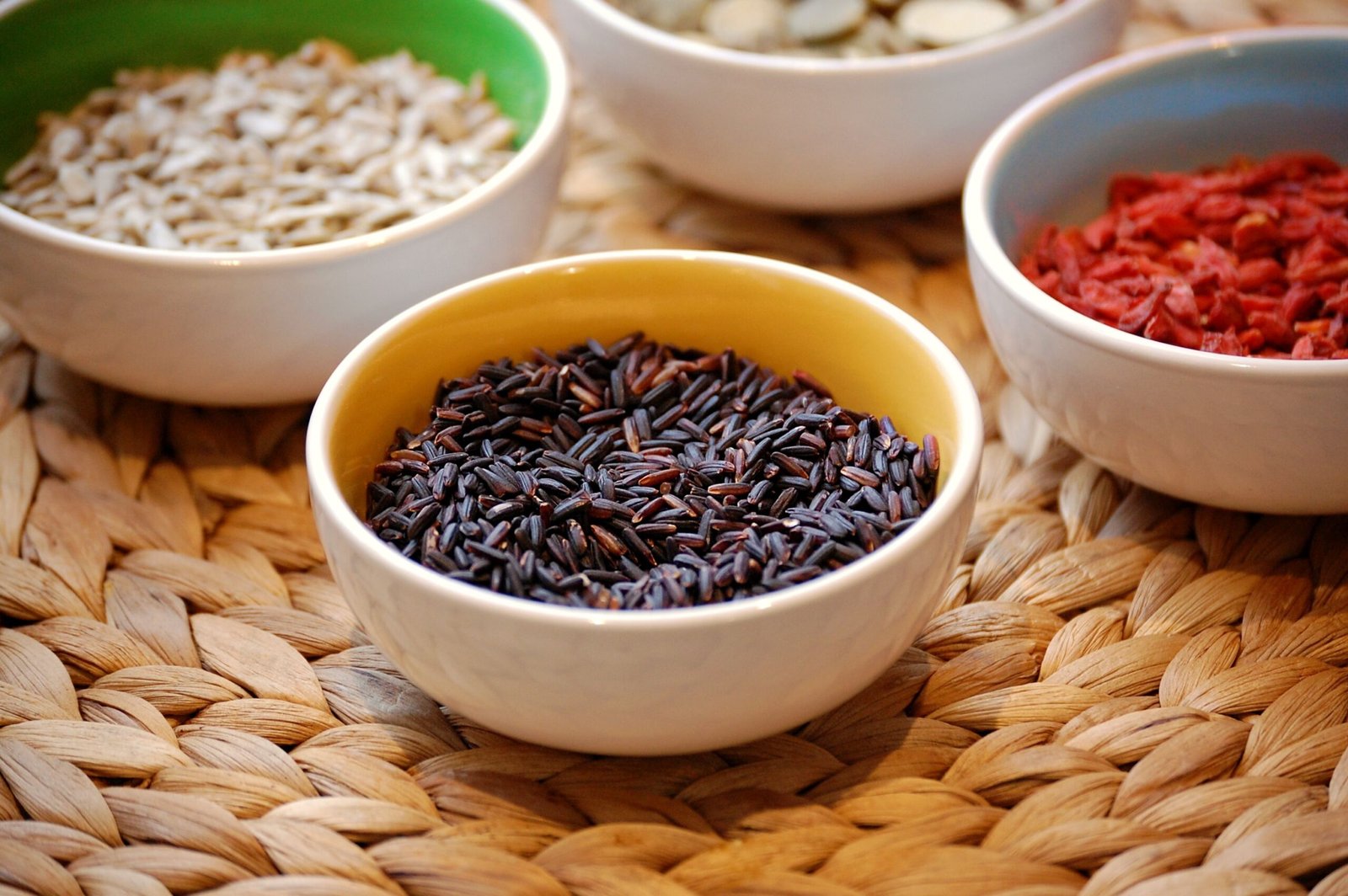 Hokkaido University study of 56 japonica rice finds black and green rice contain FAHMFAs and LNAPEs beneficial fats and digested slower than white rice for metabolic health.