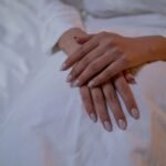 Rutgers review in American Journal of the Medical Sciences finds reddish lunulae at base of nails linked to heart failure, liver cirrhosis, rheumatoid arthritis and more.